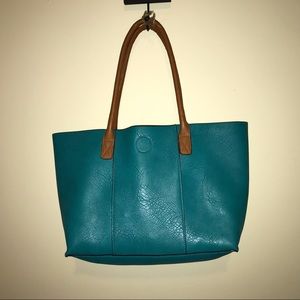 Teal tote with makeup bag and tiny card bag